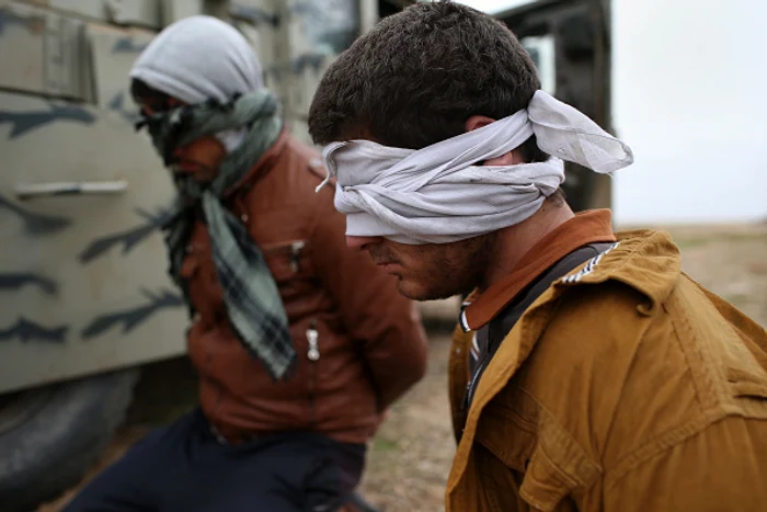 Militanții ISIS îi pedepsesc dur pe cei care le încalcă legileFoto Getty